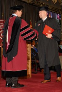 Matthew Bellamy Shaking Hands With Dean at Graduation
